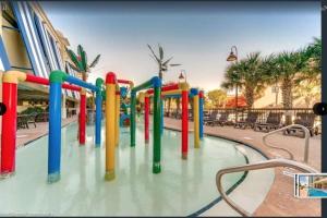 a water park with a colorful water slide at Flip Flop at Compass Cove in Myrtle Beach