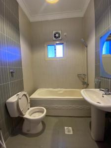 Ванная комната в منتجع أرين للوحدات السكنية
