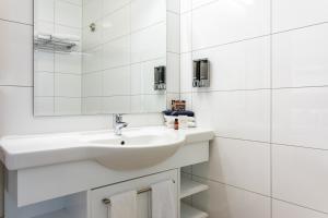 Koupelna v ubytování Tuakau Hotel + 37 fotografií
