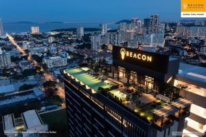 a view of a building with aazon sign on it at SkyPool with Seaview 8pax Beacon Executive Suites - Georgetown City Centre - 3km to Komtar in George Town