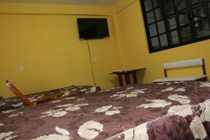 En eller flere senger på et rom på El Rincón Preferido