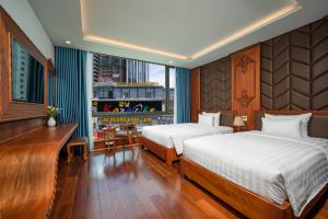 Postel nebo postele na pokoji v ubytování Monalisa Luxury Hotel