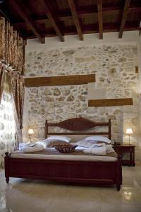 Postel nebo postele na pokoji v ubytování Antica Dimora Suites