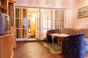 TV a/nebo společenská místnost v ubytování Hotel & Kurpension Weiss