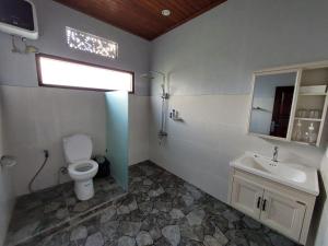 Koupelna v ubytování Merta Ubud Homestay + 37 fotografií