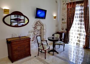 TV a/nebo společenská místnost v ubytování Antica Dimora Suites