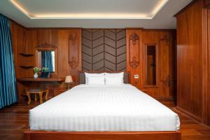 Postel nebo postele na pokoji v ubytování Monalisa Luxury Hotel