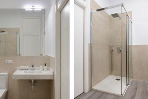 Ein Badezimmer in der Unterkunft Suites Maestranza - Herrería by Magno Apartments