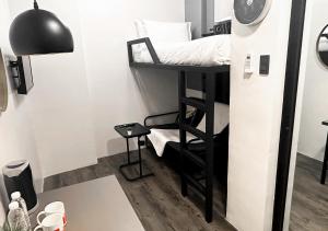 TV a/nebo společenská místnost v ubytování mySTAY Hotel BGC South