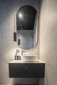 Vonios kambarys apgyvendinimo įstaigoje Green Studio apartment in Vanagupė