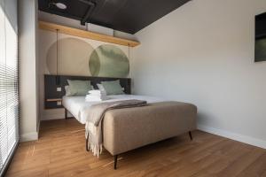 Lova arba lovos apgyvendinimo įstaigoje Green Studio apartment in Vanagupė