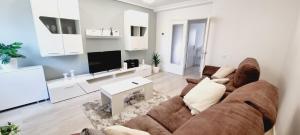 Μια τηλεόραση ή/και κέντρο ψυχαγωγίας στο Apartamento Larisa +9 φωτογραφίες