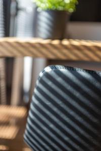 a stack of plates sitting on top of a table at Palanga Studios in Palanga