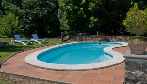 The swimming pool at or close to Hotel Can Blanc