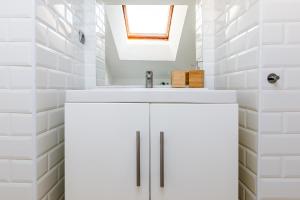 Kúpeľňa v ubytovaní Duplex Haven + 20 fotografií