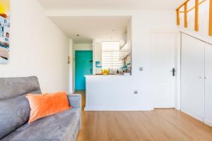 Posezení v ubytování Duplex Haven