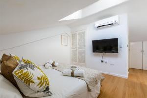 TV a/nebo společenská místnost v ubytování Duplex Haven