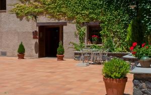 A garden outside Hotel Can Blanc