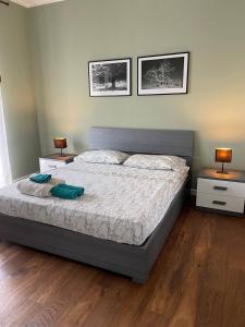 Postel nebo postele na pokoji v ubytování T-Rooms