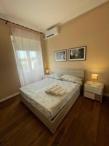 Postel nebo postele na pokoji v ubytování T-Rooms