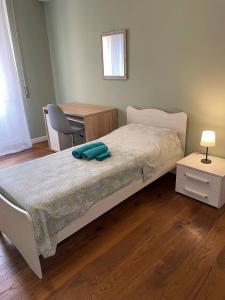Postel nebo postele na pokoji v ubytování T-Rooms