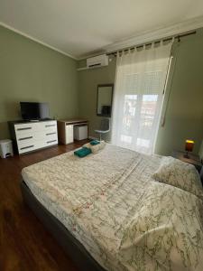 Postel nebo postele na pokoji v ubytování T-Rooms