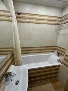 Ένα μπάνιο στο Apartment 1, Podillya +4 φωτογραφίες