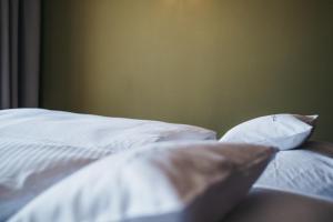Postel nebo postele na pokoji v ubytování Hotel Chesa Monte 4Sterne Superior