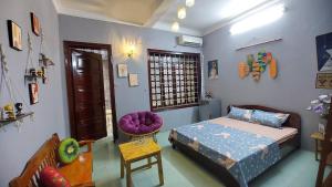 Postel nebo postele na pokoji v ubytování alley homestay_Liễu Giai