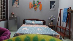 Postel nebo postele na pokoji v ubytování alley homestay_Liễu Giai