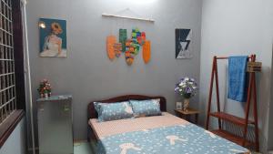 Postel nebo postele na pokoji v ubytování alley homestay_Liễu Giai