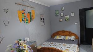 Postel nebo postele na pokoji v ubytování alley homestay_Liễu Giai