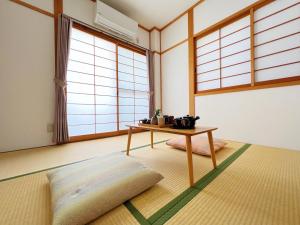 千間川-緑橋客房内的一张或多张床位