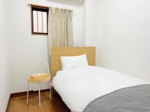千間川-緑橋客房内的一张或多张床位