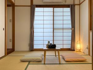 千間川-緑橋客房内的一张或多张床位
