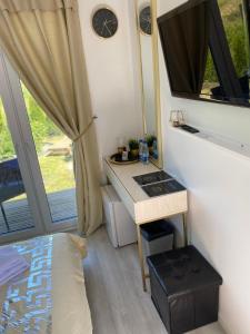 TV a/nebo společenská místnost v ubytování MMA apartament