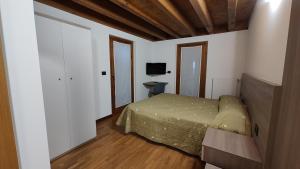 Postel nebo postele na pokoji v ubytování Wine Resort