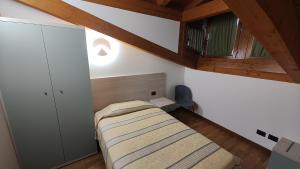 Postel nebo postele na pokoji v ubytování Wine Resort