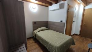 Postel nebo postele na pokoji v ubytování Wine Resort