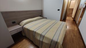 Postel nebo postele na pokoji v ubytování Wine Resort