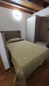 Postel nebo postele na pokoji v ubytování Wine Resort
