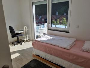 Postel nebo postele na pokoji v ubytování Loft Nagoldtal