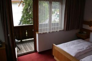 Postel nebo postele na pokoji v ubytování Haus Oberland
