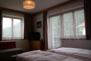 Postel nebo postele na pokoji v ubytování Haus Oberland