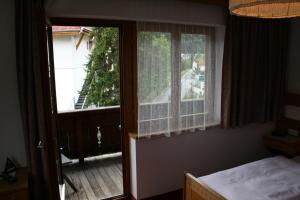 Postel nebo postele na pokoji v ubytování Haus Oberland