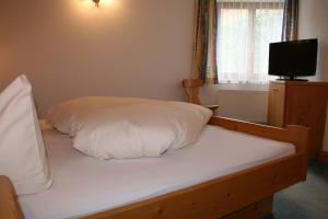 Postel nebo postele na pokoji v ubytování Haus Oberland