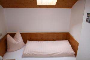 Postel nebo postele na pokoji v ubytování Haus Oberland