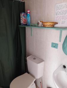a bathroom with a white toilet and a sink at Acoran Family Ocean View Guest House With Daily Yoga Practice Included North Gran Canaria PRIVATE ROOM PET FRIENDLY in Firgas +71 photos