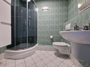Kúpeľňa v ubytovaní Apartament Słoneczny
