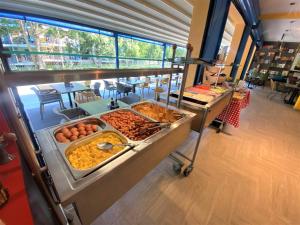 a buffet line with many different types of food at Solei Apartments in Primorsko